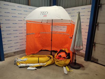 a tent with a life jacket and a life jacket next to it