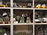 many pots and pans on the shelves in the room