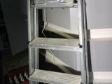 a ladder that is leaning up against a wall