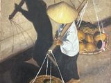 un tableau représentant une femme portant un panier de fruits sur le dos