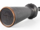 a close up of a telescope on a white surface with a white background