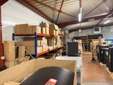 a large warehouse with a lot of boxes on the shelves