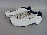 pair of white and blue sneakers with laces on them