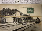 une carte postale sur laquelle figure l'image d'un train