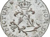 an old silver coin with a crown on top of it
