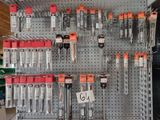 many tools on the wall in the store for sale