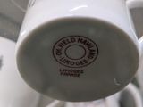 a close up of a coffee cup on a saucer