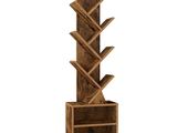a close up of a wooden book shelf with several shelves
