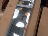 a cardboard box with a pair of skis in it