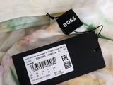 a close up of a dress with a price tag on it
