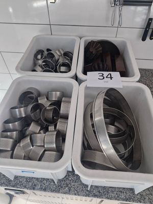 two bins filled with different types of metal items