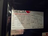 a picture of a sign on a door that says seda