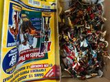 a box of assorted toys sitting on a table