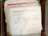 a box with a lot of papers in it