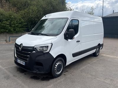a picture of a white van parked in a parking lot