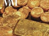 un tas de pièces d'or et un lingot d'or