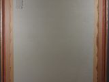 an image of a picture of a painting hanging on a wall