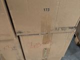 a stack of boxes with a price tag on them