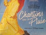 affiche de cinéma représentant une femme en imperméable jaune tenant un parapluie rouge