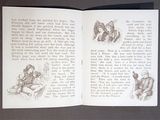 an open book with a drawing of a man and a woman