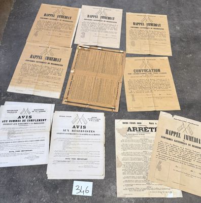 several old papers are scattered on the floor next to each other