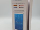 a box with a phone inside of it on a white surface