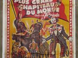 a poster advertising a circus show with clowns and circus performers
