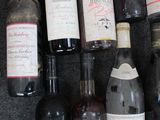 many bottles of wine that are on the table
