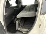 a car that has a blanket in the back of it