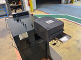 a machine that is sitting on the floor in the garage