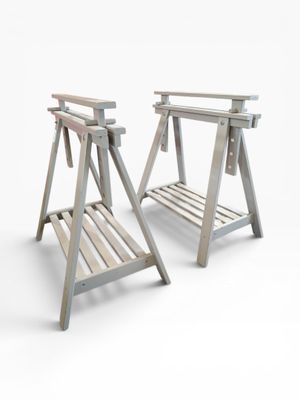 two wooden benches sitting next to each other on a white surface