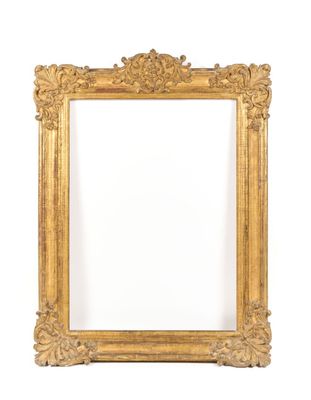 a gold frame with a white background and a white wall