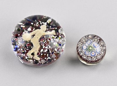 a picture of a pair of buttons with glitter on them