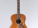 une image représentant une guitare accrochée à un mur, sur fond blanc