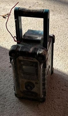 a radio that is sitting on the floor on the floor