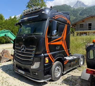 a truck that is parked on the side of the road