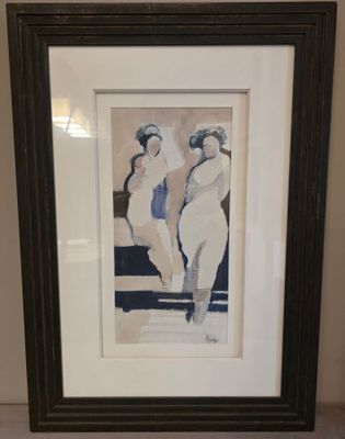 tableau représentant trois femmes, dans un cadre noir, accroché au mur