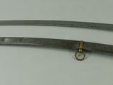 two swords that are on the table together
