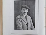 a book with a picture of a man in a suit and tie