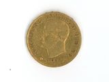 an image of a gold coin on a white surface