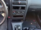 a car dashboard with a steering wheel and dashboard controls