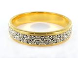 a close up of a ring with diamonds on a white surface