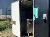 a black container that has a sink inside of it