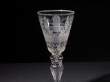 a glass that is sitting on a table
