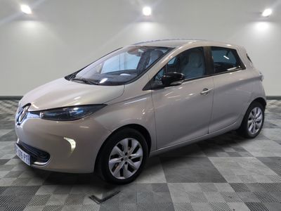 a picture of a silver car in a showroom