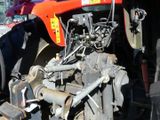 an image of a truck with a big engine in the back of it