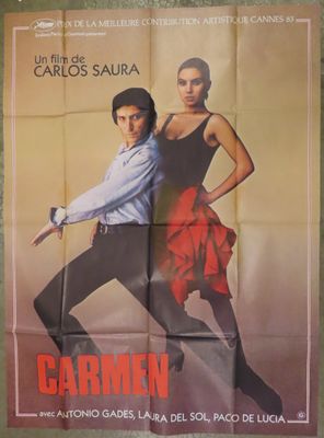 the poster for the movie carmen is hanging on the wall