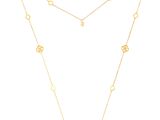 un collier en or composé d'une longue chaîne ornée d'un motif floral
