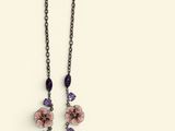 necklace and earring set with pink flowers and purple crystals