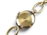 an image of a close up of a watch on a chain